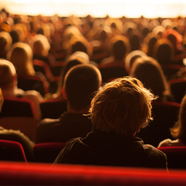 Audiences enjoying a performance at the Torch Theatre